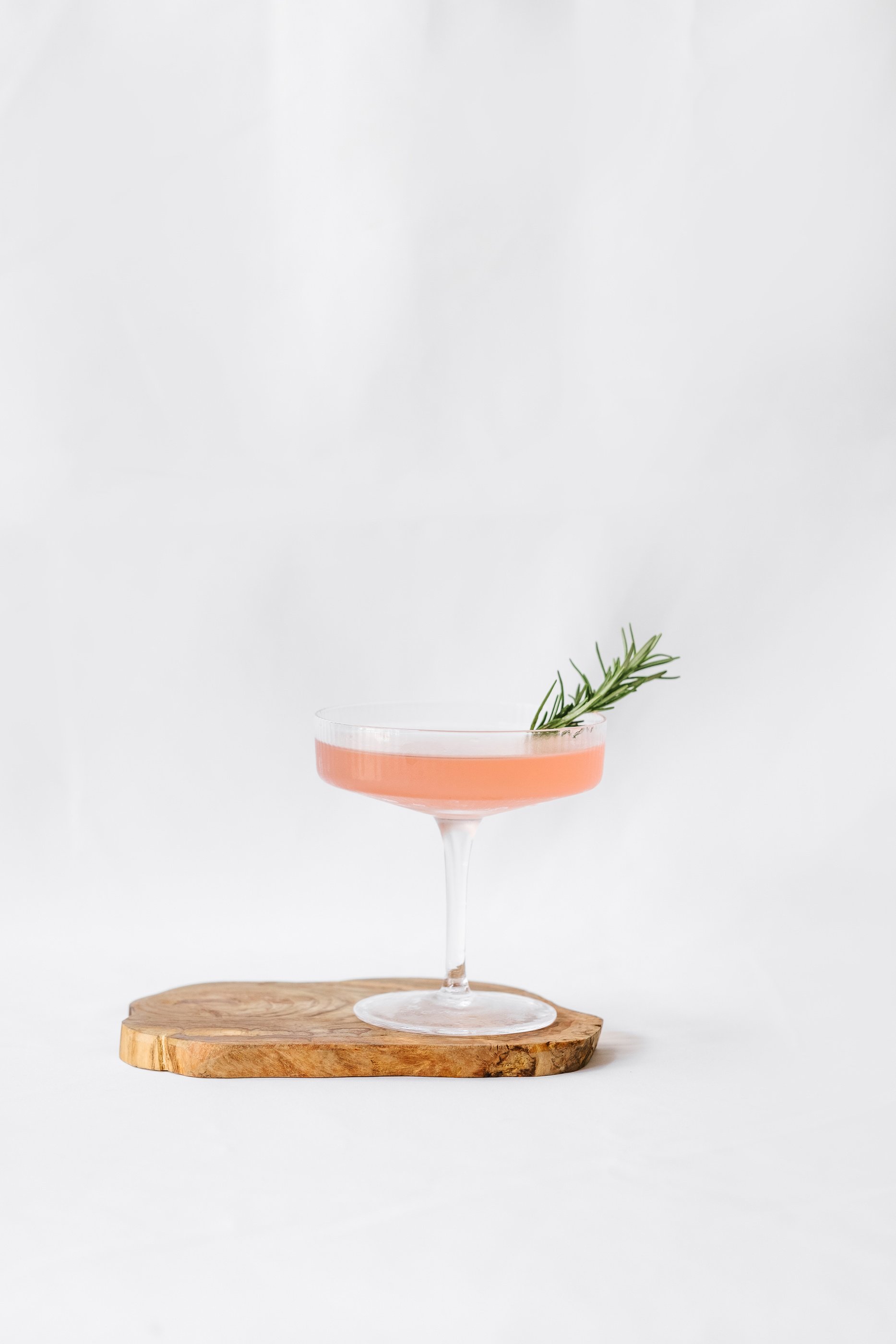 Pink Cocktail with Rosemary